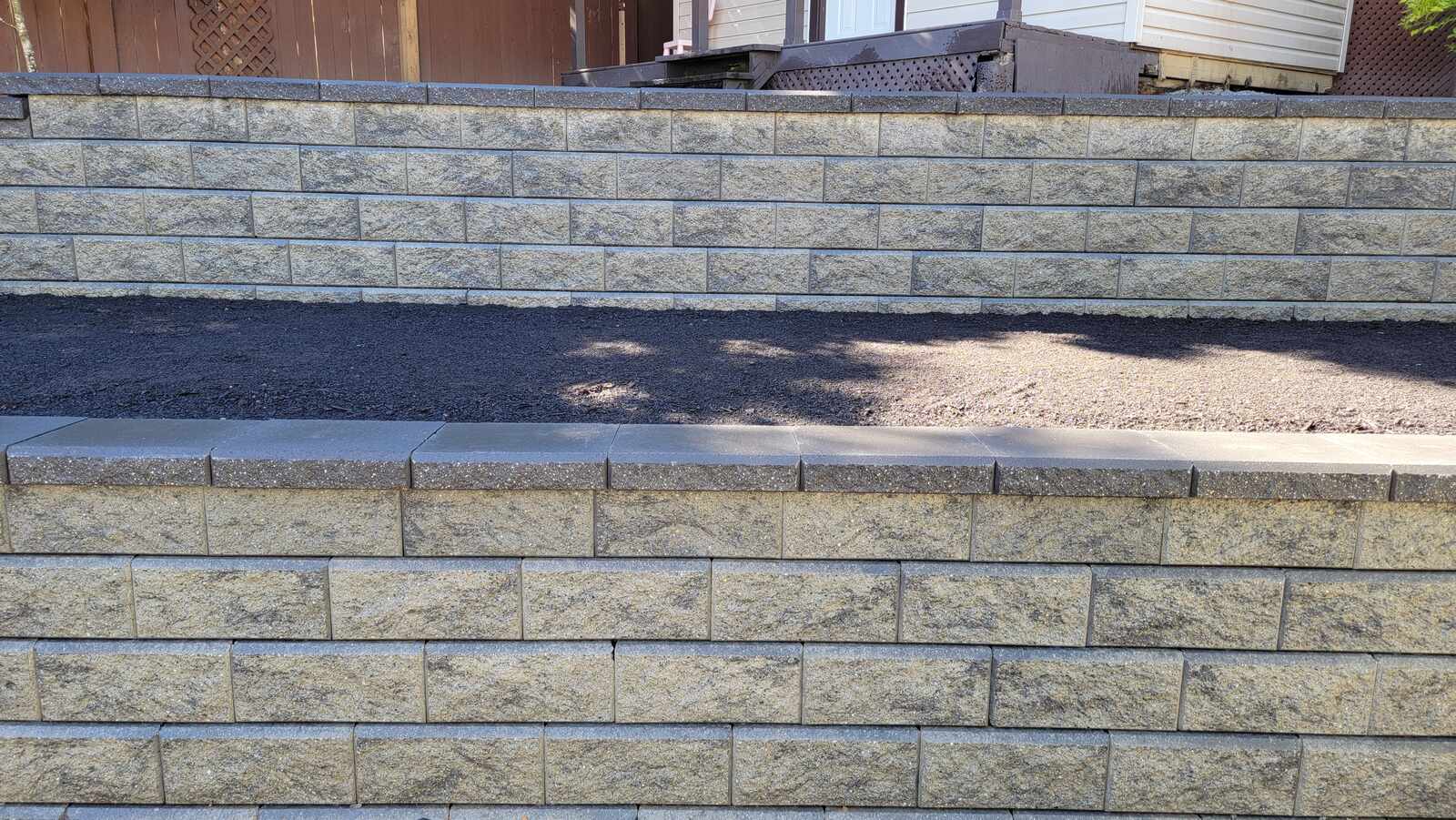 23_Close-up of completed retaining wall construction by Back40 Landscaping in Mission, BC
