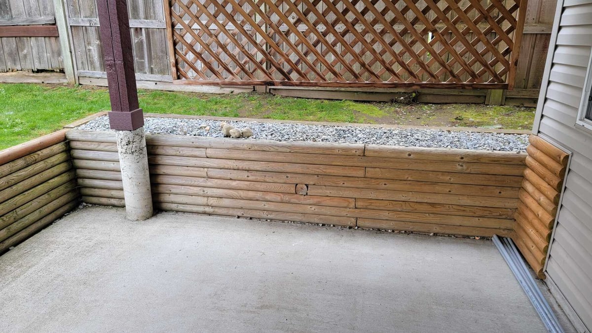 4_Retaining wall and patio construction underway, gravel layer compacted by Back40 Landscaping in Mission, BC